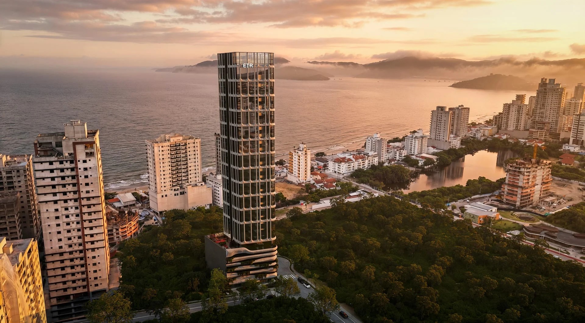 Visualização 3D de um empreendimento residencial junto ao mar, ao pôr do sol